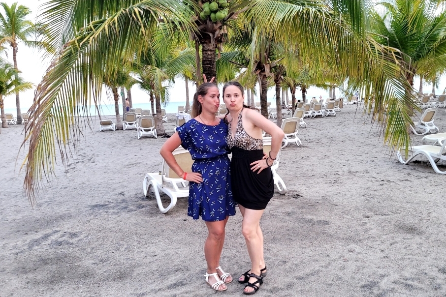 My sister Irina and I are goofing around on the beach of Panama.